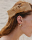 Elegant gold-plated pear-shaped earrings with diamond accents, evoking the lush beauty of a fruitful harvest.