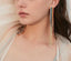 Rainbow curtain statement earrings with sterling silver posts, featuring vibrant rainbow colors and long, flowing chains.