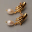 Abstract Hand Pearl Earrings