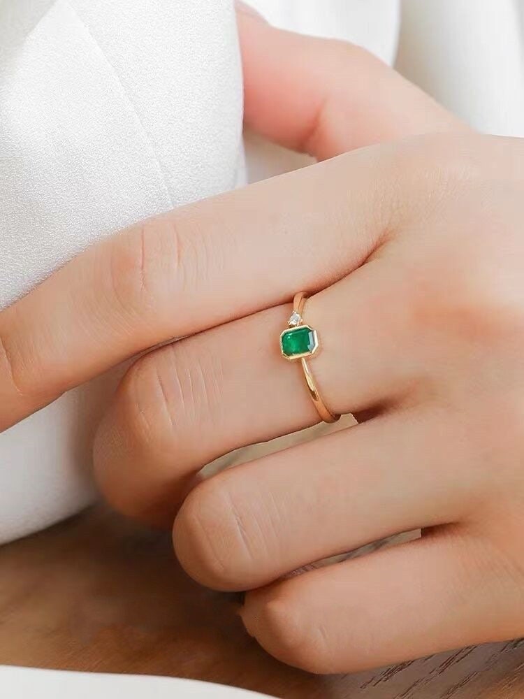 Tiny emerald ring