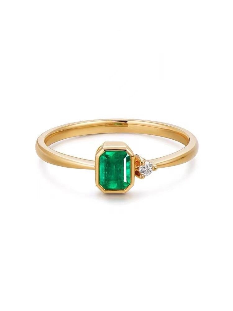 Tiny emerald ring